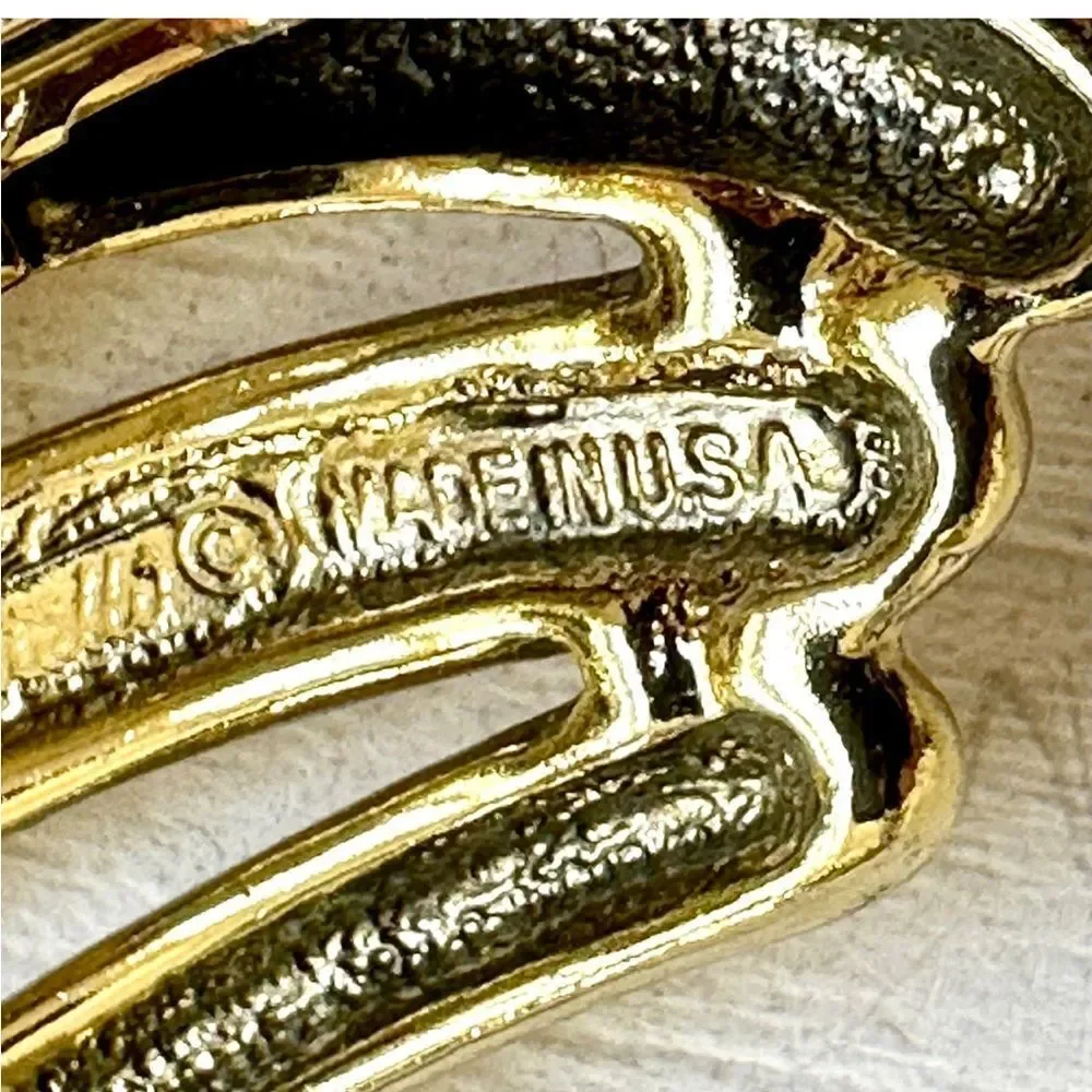 Gold tone brooch